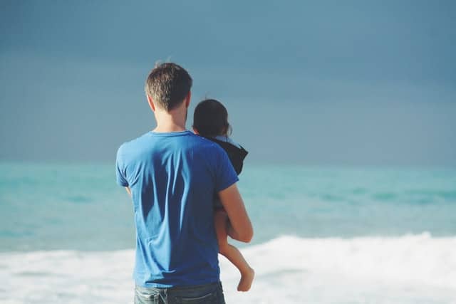 texas man with child at beach during visitation 