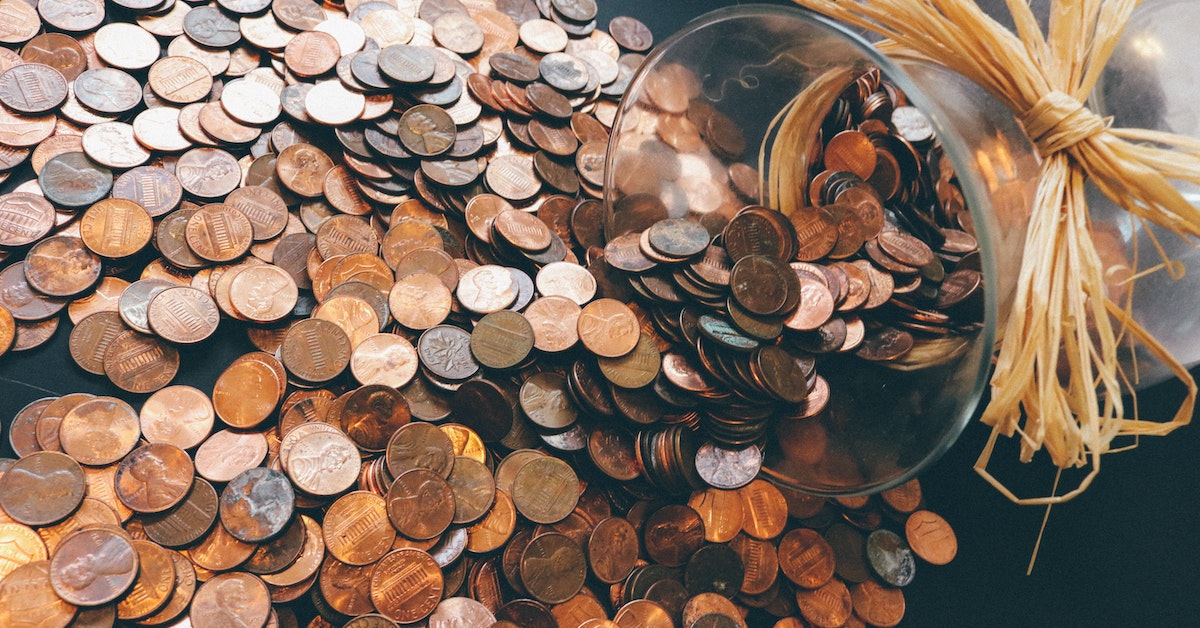 jar full of pennies representing alimony in texas