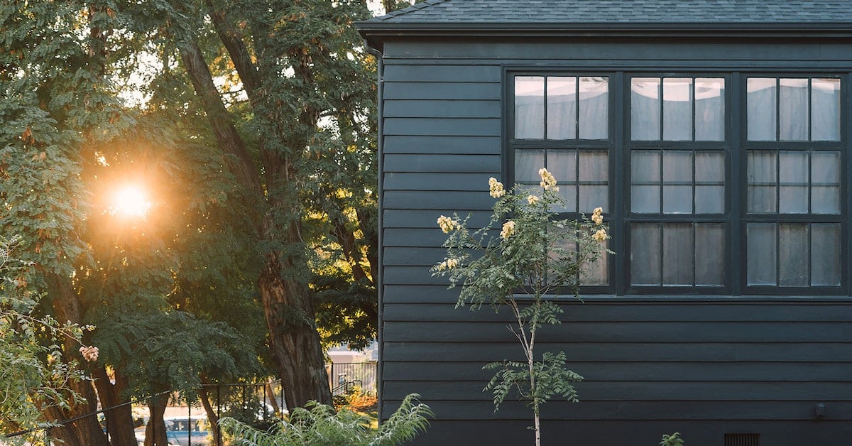 dark blue home exterior awarded to one spouse in texas divorce
