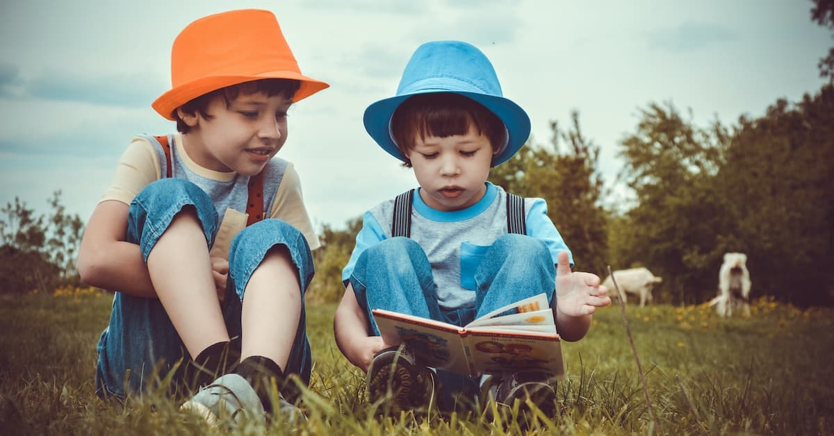 kids reading in grass wearing hats that don't live in texas anymore for the purposes of divorce