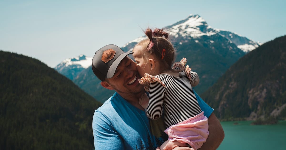 father hugging daughter and supporting her during his texas divorce