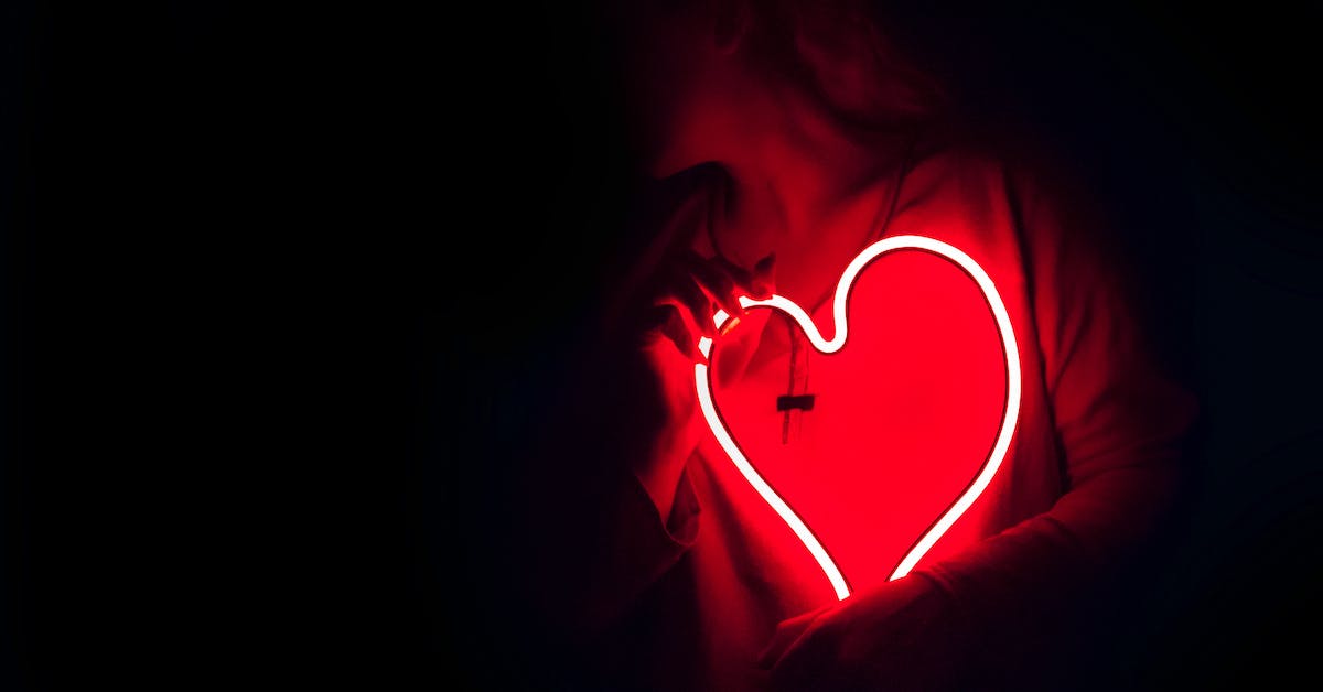 red neon heart symbolizing affair in texas divorce
