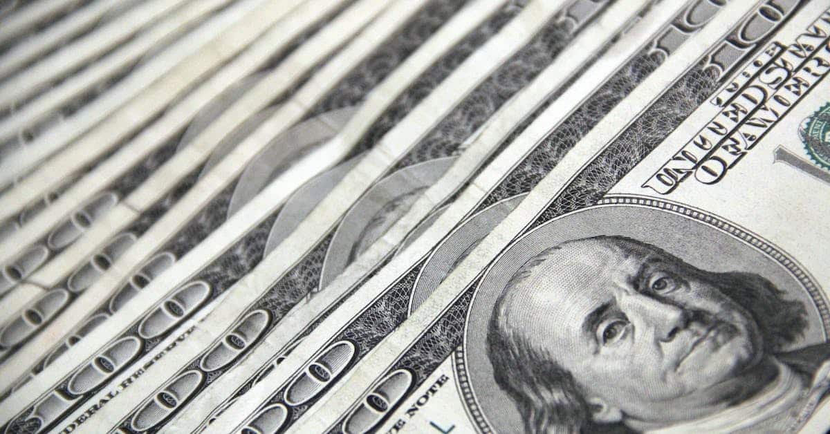 stack of cash to be used for alimony in texas
