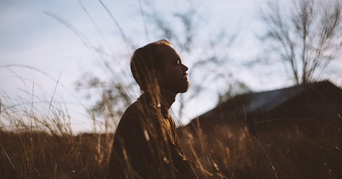 man meditating as a form of self care when spouse is cheating in texas