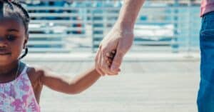 parent and child holding hands how to sign away parental rights in texas